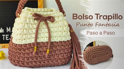Foto de bolso de trapillo terminado para silla de paseo