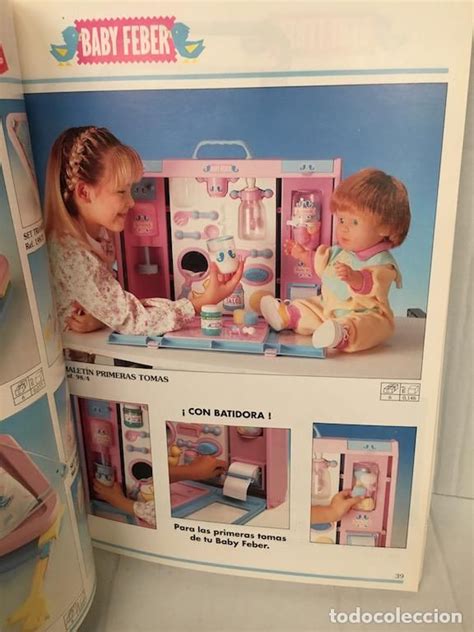 Foto de la muñeca Baby Feber original y sus accesorios variados