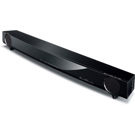 Barra de sonido Yamaha elegante y moderna colocada discretamente debajo de un televisor.