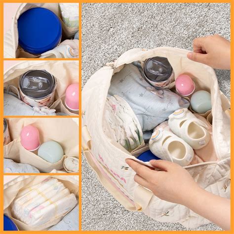 Foto de una bolsa de hospital abierta con ropa de bebé cuidadosamente doblada