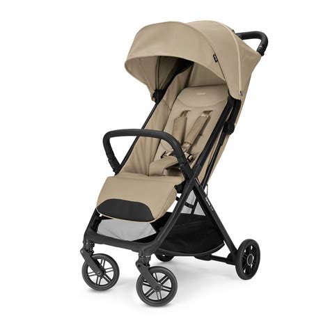 Foto principal de la silla de paseo Inglesina Zippy Light en color beige con un bebé dentro