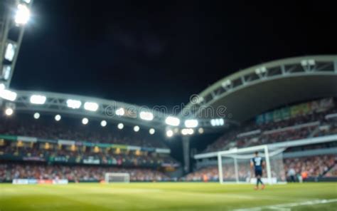 Imagen: Fotografía de un estadio de fútbol español abarrotado durante un partido importante.