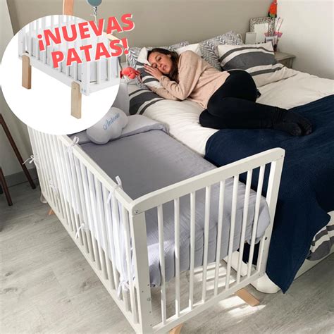 Kit de colecho instalándose en una cuna infantil