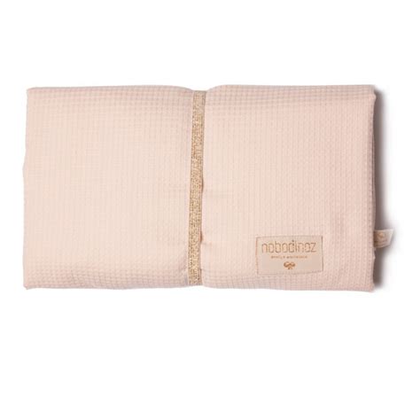Cambiador de viaje impermeable Nobodinoz Mozart doblado y desplegado