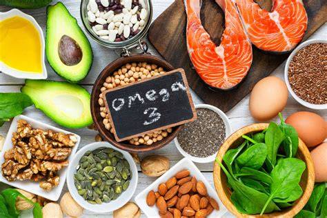 Infografía sobre fuentes alimenticias ricas en omega-3 (pescado graso, frutos secos)