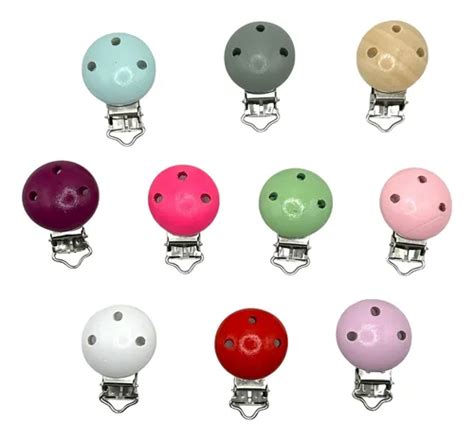 Variedad de clips y portachupetes de colores