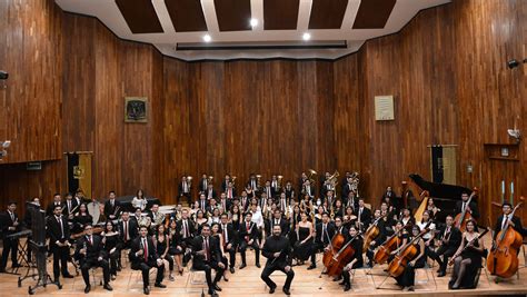 Infografía que detalla el programa musical y la formación de la banda sinfónica