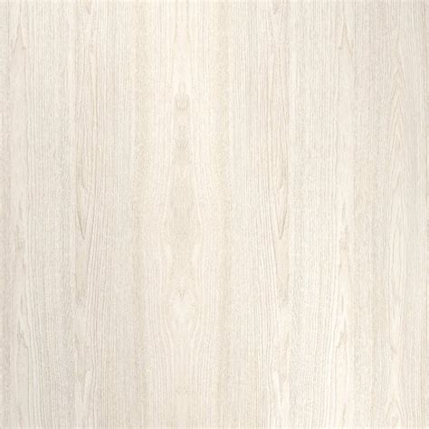 Detalle de la textura de una cuna de melamina en color madera.