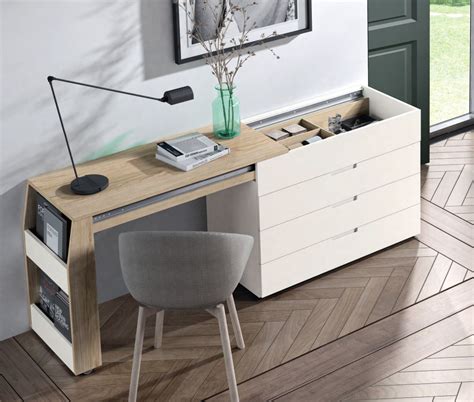 Diseño de una cómoda cambiador convertible que se transforma en escritorio y cajonera.