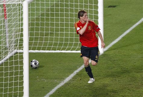 Fotografía de Fernando Torres celebrando un gol con el Liverpool