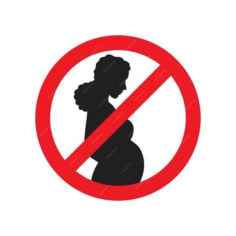 Imagen de una mujer embarazada señalando una señal de prohibido con pastillas