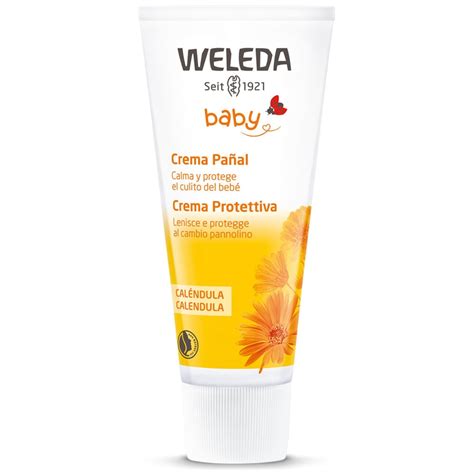 Foto de un bebé con productos Weleda de caléndula