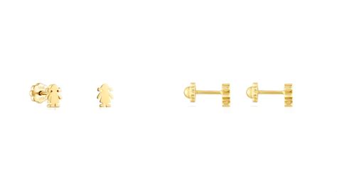 Foto de varios pendientes Tous para bebé (oso, estrella, flor)