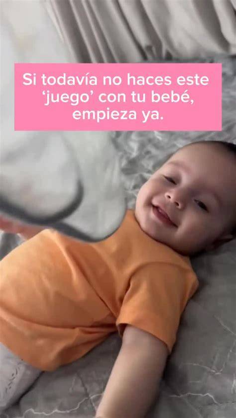 Bebé siendo despertado suavemente para alimentarse