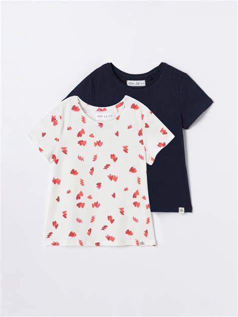 variedad de packs de camisetas para bebé en diferentes colores y estilos