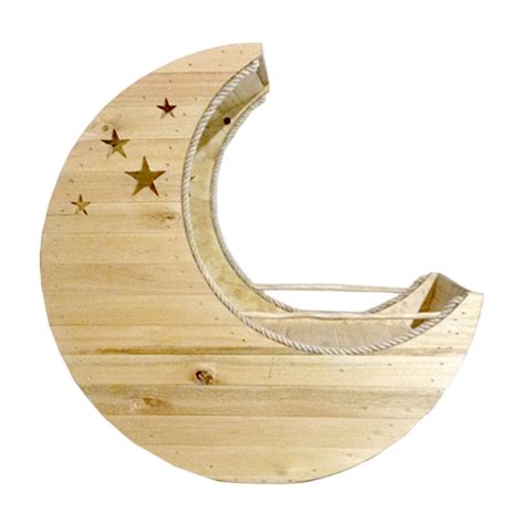 Diseño de cuna con forma de luna con estrellas recortadas