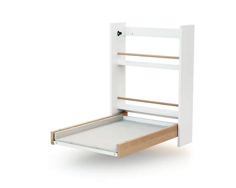 Diagrama de un cambiador de pared abatible con sus dimensiones y componentes