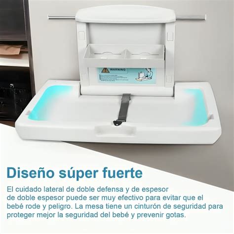 Diseño plegable y compacto del cambiador portátil de Mimuselina desplegado sobre una superficie