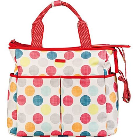 Detalle de una bolsa de paseo Tuc Tuc con compartimentos organizados.