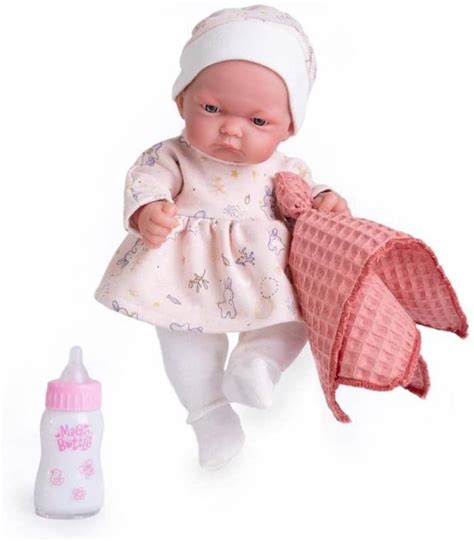 Detalle del atuendo de la muñeca Bebé Pitu: camiseta con estrellitas y culotte.