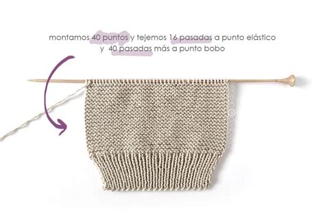 Esquema de una polaina para recién nacido destacando la cinturilla elástica, el tejido de algodón y la pieza integrada del cubrepies.