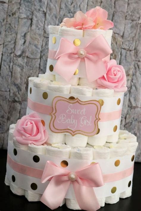 Tarta de pañales para niña en tonos rosa pastel