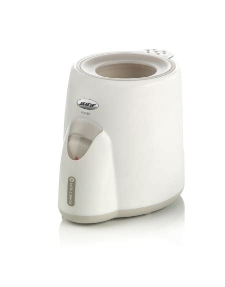 Bloque de apoyo para el calientabiberones Jané, que asegura estabilidad en el coche y se transforma en estuche para guardar el enchufe.