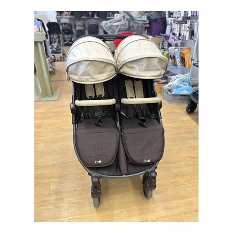 Foto de una silla gemelar con capazos blandos