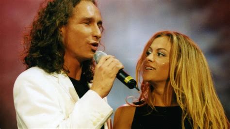 Foto de Miguel Bosé y Paulina Rubio juntos, promocionando la canción 