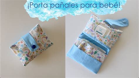 Foto de un bolso porta pañales a crochet bien organizado con pañales, toallitas y crema