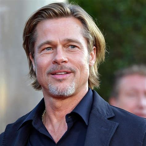 Infografía comparativa de la edad de Brad Pitt y George Clooney al ser padres