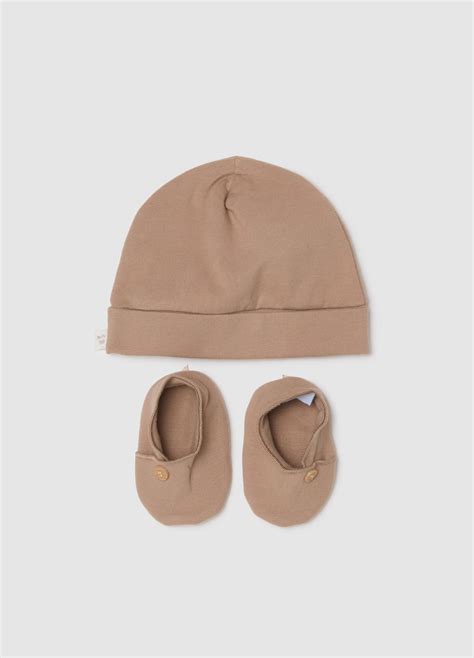 Conjunto de gorro, manoplas y patucos de algodón para recién nacidos.