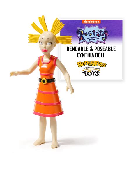 Imagen de Cynthia, la muñeca de juguete con su característico cabello despeinado y vestimenta de rayas.