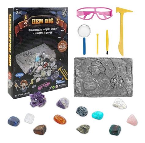 Fotografía de un kit científico con herramientas de excavación, gemas y geodas decoradas