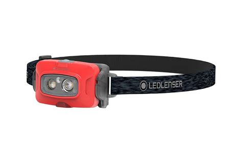 Linterna frontal Ledlenser Kidled2 en uso por un niño en un entorno oscuro.