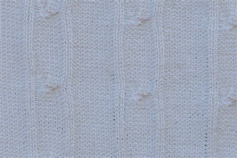 Primer plano de la textura de un tejido de algodón para bebé