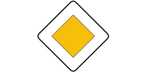 Señal de tráfico triangular amarilla de precaución
