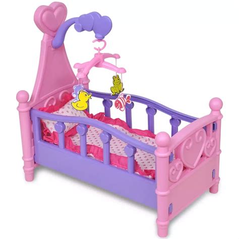 Cuna de muñecas rosa y morada con móvil de animales y ropa de cama con corazones
