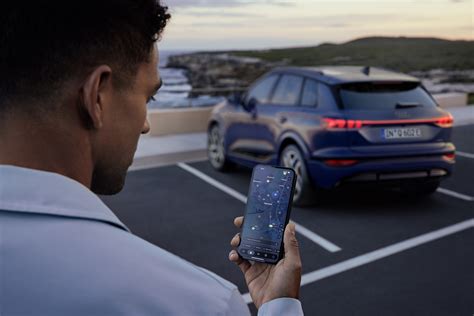 Smartphone con la aplicación myAudi mostrando el estado del vehículo