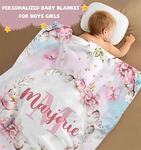 Manta personalizada para bebé plegada elegantemente en una caja de regalo