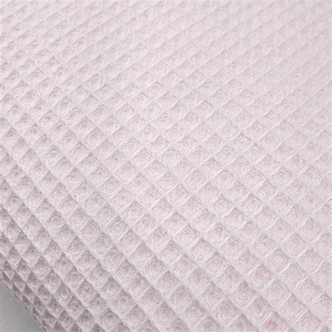 Tela piqué waffle en color rosa para la parte superior de la funda