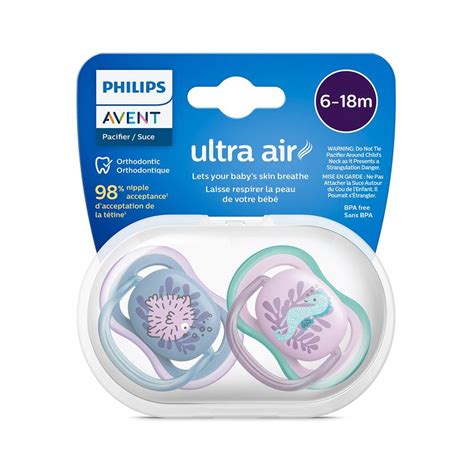 Foto de chupetes Philips Avent y un vigilabebés en un entorno hogareño