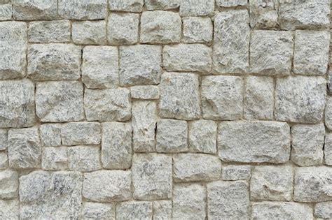 Ejemplo de una pared con textura de roca artificial creada con mortero.