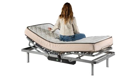 cama articulada con accesorios de seguridad y colchón antiescaras
