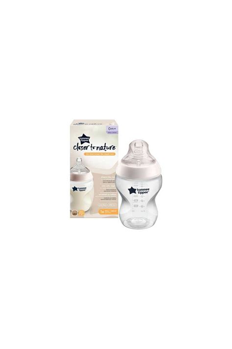 Foto del dosificador Tommee Tippee Closer to Nature dentro de un biberón de 260 ml