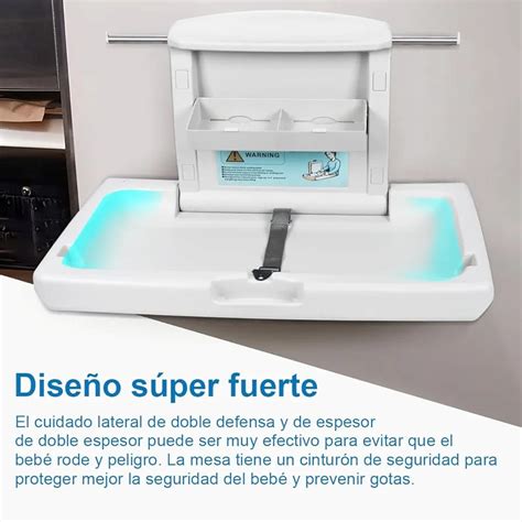 Detalle del cinturón de seguridad en cambiador de bebé