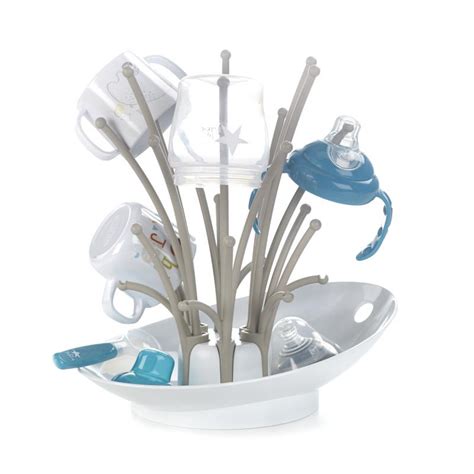 Infografía detallando las partes extraíbles y la base cóncava del escurrebiberones Cloud de Jané